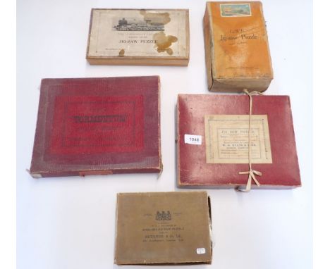 A collection of wooden jigsaw puzzles including Chad Valley GWR Great Western Railway puzzles x 2, The Tormentum etc - all bo
