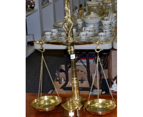 A set of Librasco brass balance scales, integrated weights