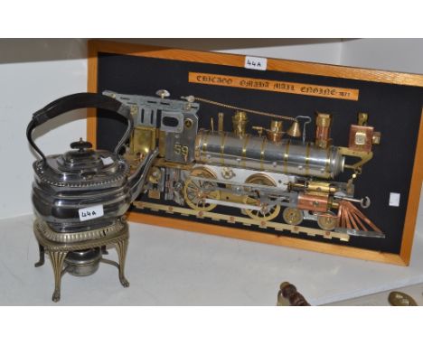 A Stanwood design picture, made from keys, cogs, etc Chicago Omaha Mail Engine, 1871, 34cm x 62cm. framed;  an EPNS boat shap