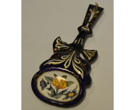 A 19th century enamel caddy spoon
