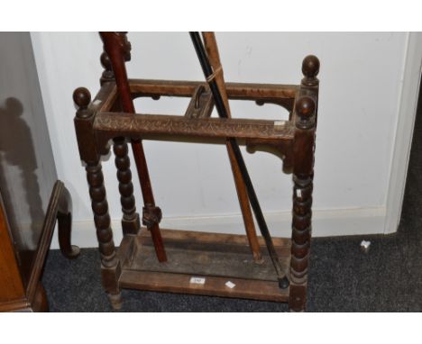 An early 20th century bobbin turned walking stick stand, c.1930