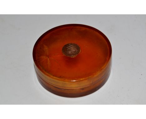 An early 19th century gold coloured metal mounted horn snuff box