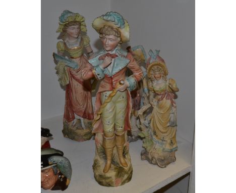 A pair of early 20th century German bisque figures, of a gallant and companion, 37cm high, c.1910;  another, pair smaller (4)