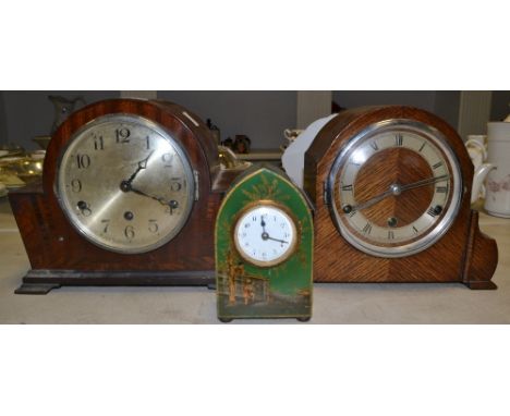 An Art Deco walnut mantel clock,single winding hole, striking on gongs,c.1930