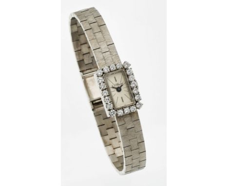 Damenarmbanduhr Chopard,Schweiz 1960/70er Jahre. 18 kt WG, Handaufzug, besetzt m. 20 Brillanten v. zus. ca. 0,80 ct, Werk-Nr.