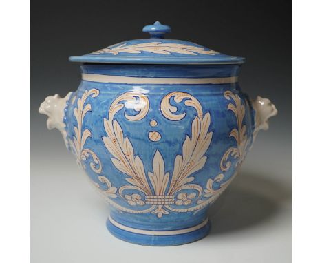 Colossal hand-painted Italian maiolica lidded jug in vibrant cobalt blue with intricate cream grotesque decoration, crafted i