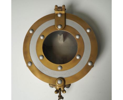 Uniquely designed Jean Pierre Lepine Graphyscaf The Ocean Ten display case, inspired by a nautical porthole with brass and si