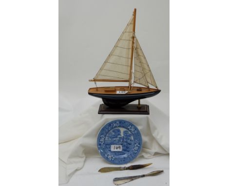 Small model of a clipper, Copeland plate, shoe horn and bone butter knife (4)