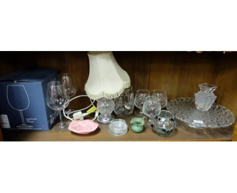 Shelf of glass items – table lamp, jug, small vase, brandy glasses