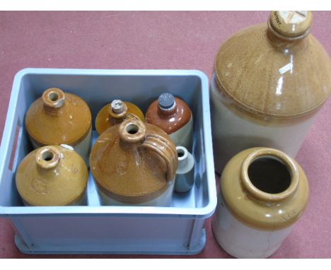 Large stoneware bottle 6 smaller examples and a stone hot water bottle