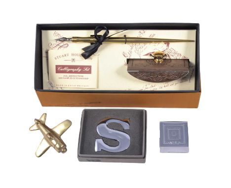 A collection of Stuart Houghton brass and chromed paperweights, to include a brass pocket watch; fighter plane; sewing kit; d