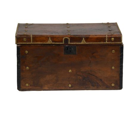 Stained wooden trunk with brass studding, width 83.5cm, depth 47cm, height 46cm.