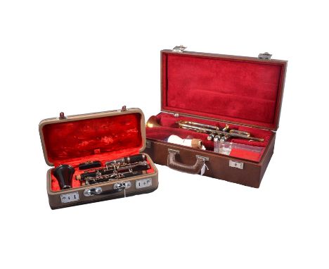 Rudy Muck 5M trumpet, brass and chrome, Maynard Ferguson mouthpiece and mut, in case; and a Hsinghai clarinet, cased.Qty: 2