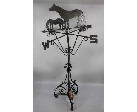 A Vintage Garden Weathervane with Horse and Foal Motif, Wrought Iron, Upon Unrelated Oil Lamp Tripod Base, Total Height 73cms
