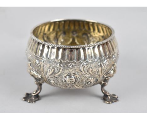 A Silver Sugar Bowl with Repousse Decoration on Three Feet, 171gms, London Hallmark, Together with A Silver Plated Thimble.