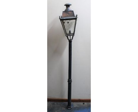 A Reproduction Metal Garden Lamp in the Form of a Victorian Street Lamp, In Need of Attention, 201cms Tall 