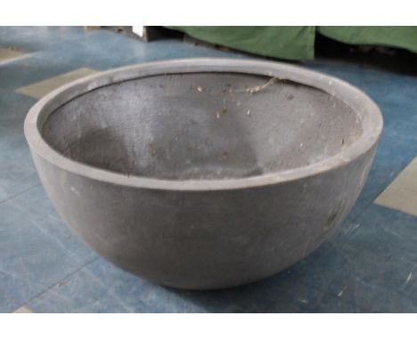 A Large Resin Circular Garden Planter, 56ms Diameter 