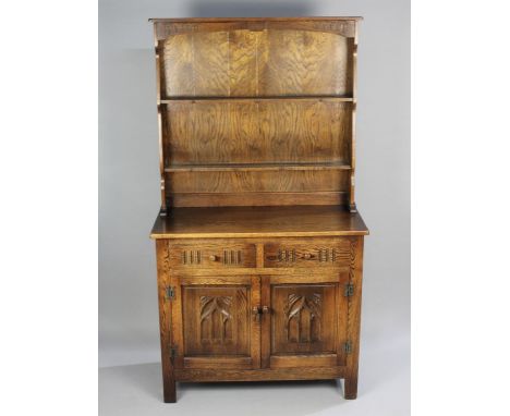 A Mid 20th Century Oak Dresser in the Old Charm Style, Base Section with Two Small Drawers over Cupboard with Carved Panelled