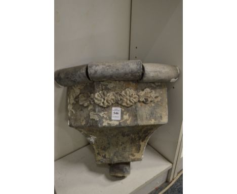 A lead corner rainwater hopper.