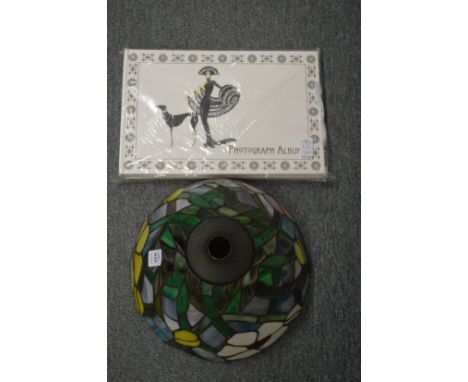 An Art Nouveau style lamp shade and photograph album.