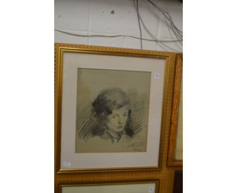 A charcoal portrait of a young lady.