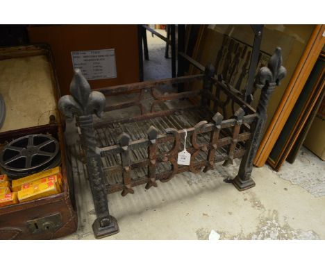 A cast iron fire grate.