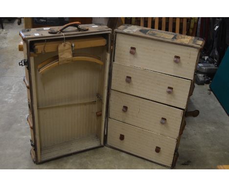 An old wardrobe trunk with Cunnard and other labels.