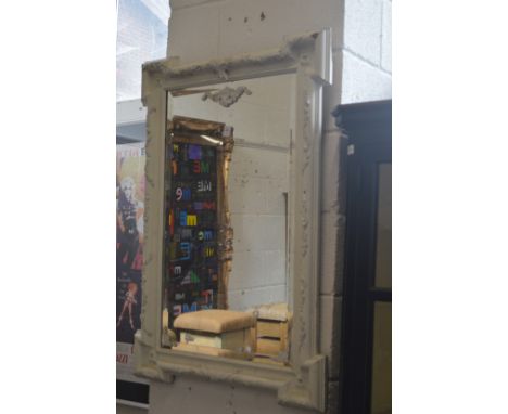 A decorative wall mirror.