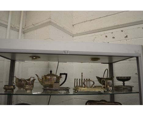Plated items to include a three piece tea service, desk stands etc.