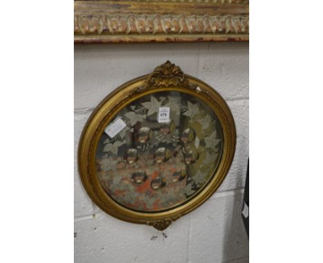 An etched circular mirror with gilt frame.