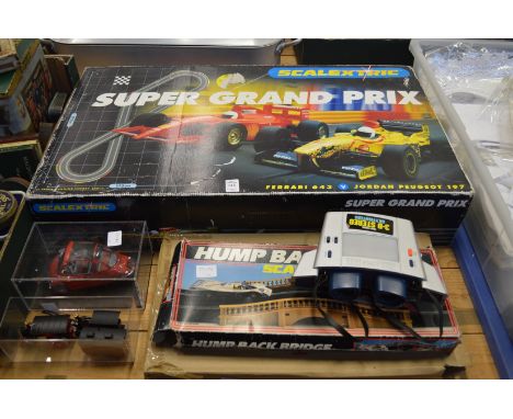 A Scalextric Super Grand Prix racing set and other toys.