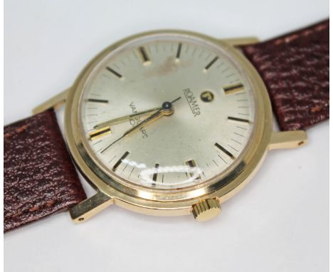 A vintage 1960s hallmarked 9ct gold Roamer Vanguard 304 wristwatch with with signed champagne dial, gold and black hour marke