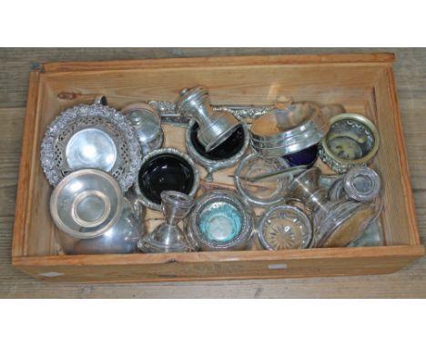 A box of hallmarked silver and silver plate including a pepper mill, candlesticks, button hooks, salts etc.&nbsp;Silver items