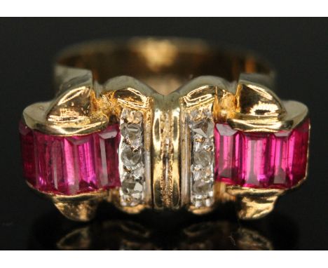 A diamond and ruby cluster ring, cluster length 21mm, unmarked, gross wt. 7.95g, size L.  