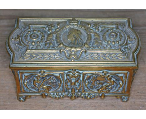 A gilt brass casket circa 1900, the top decorated in relief with a portrait depicting Queen Victoria in side profile, length 