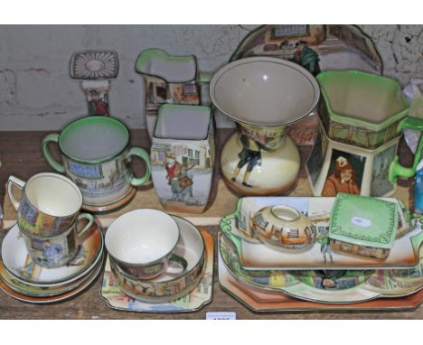 22 pieces of Royal Doulton series ware, 21 featuring Dickens characters including vases, plates, cups and saucers, dishes, an