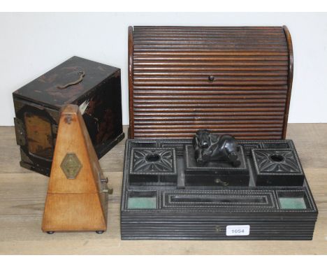 A mixed lot of treen comprising an ebonised eastern desk stand, a chinoiserie trinket box, a stationary box and a 19th centur