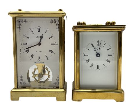 An English eight-day timepiece carriage clock in  a Corniche styled case, with an eleven jewelled movement and lever platform