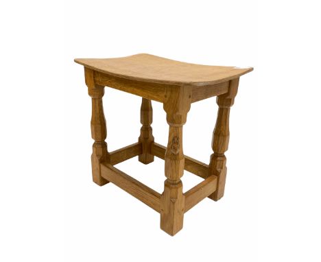 Robert 'Mouseman' Thompson of Kilburn - Yorkshire oak stool, the dished and adzed top raised on four faceted octagonal suppor