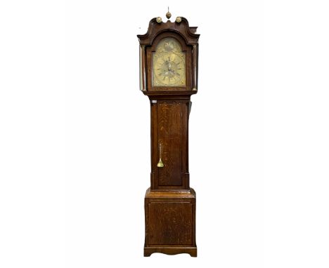 An oak longcase clock with an associated dial and movement, the oak case with a swans neck pediment, brass paterae and centra