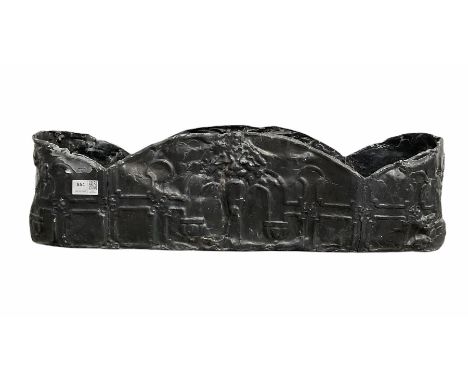 Early 19th century lead trough planter, the lobed top over strap work design centred by lion mask W65cm