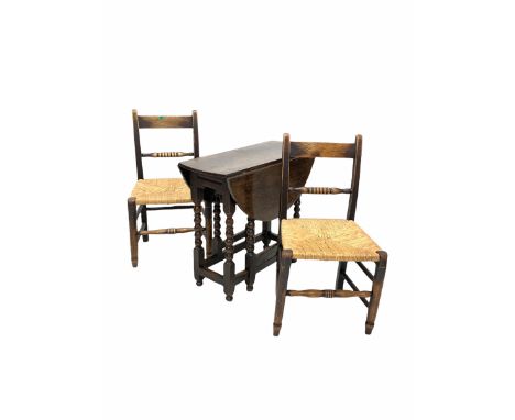18th century oak drop leaf table, the oval top raised on bobbin turned supports with gate leg action, together with a pair of
