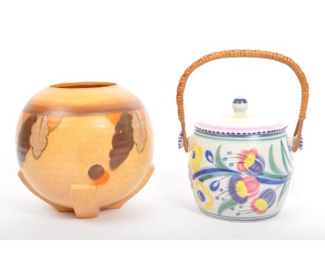 A vintage 20th century Poole pottery ceramic lidded pot, with woven handle circular lid with polychrome painted floral decora
