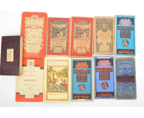 A collection of early 20th century circa 1930s Bartholomew's maps mounted on cloth. The lot to include: Bartholomew's New Red