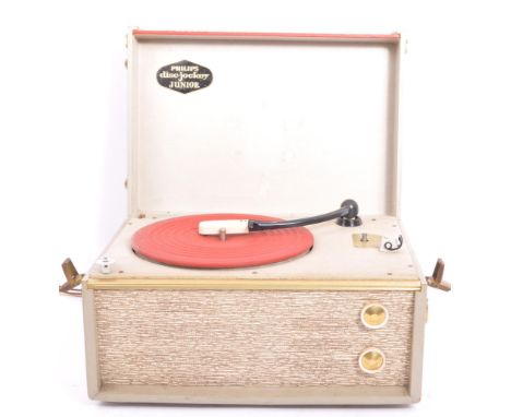 A retro vintage mid 20th century Philips Disc Jockey Junior. Rectangular form with hinged lid to reveal a record player with 