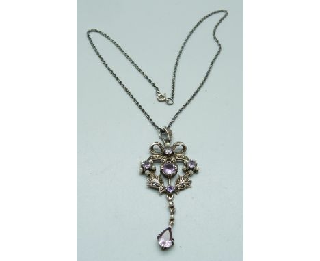 A silver, amethyst and seed pearl pendant and chain 
