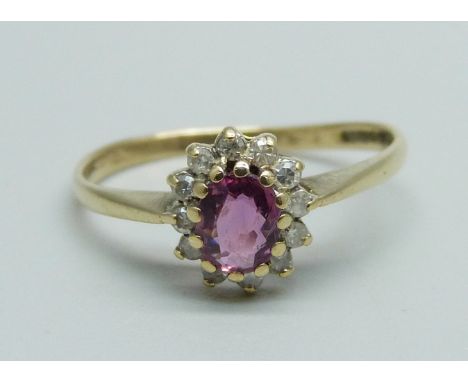 A 9ct gold, amethyst and diamond cluster ring, 1.4g, N 