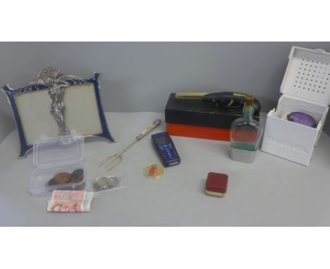 A Diesel wristwatch, a/f, an Art Nouveau style frame, a novelty lighter, a cognac flask, coins including silver, two bank not