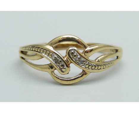 A 9ct gold and diamond ring, 1.8g, Q 