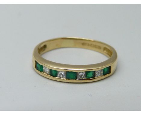 An 18ct gold, emerald and diamond ring, 2.1g, K 